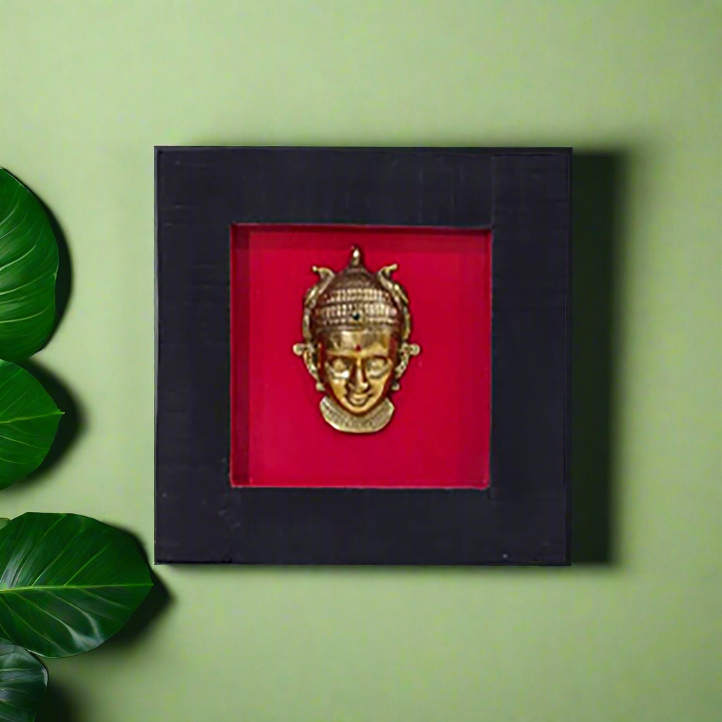 Female figurine in a wooden frame