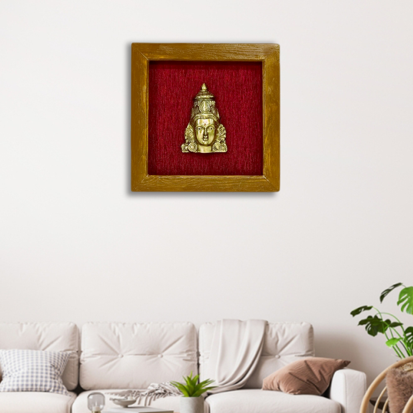 Female figurine in a wooden frame