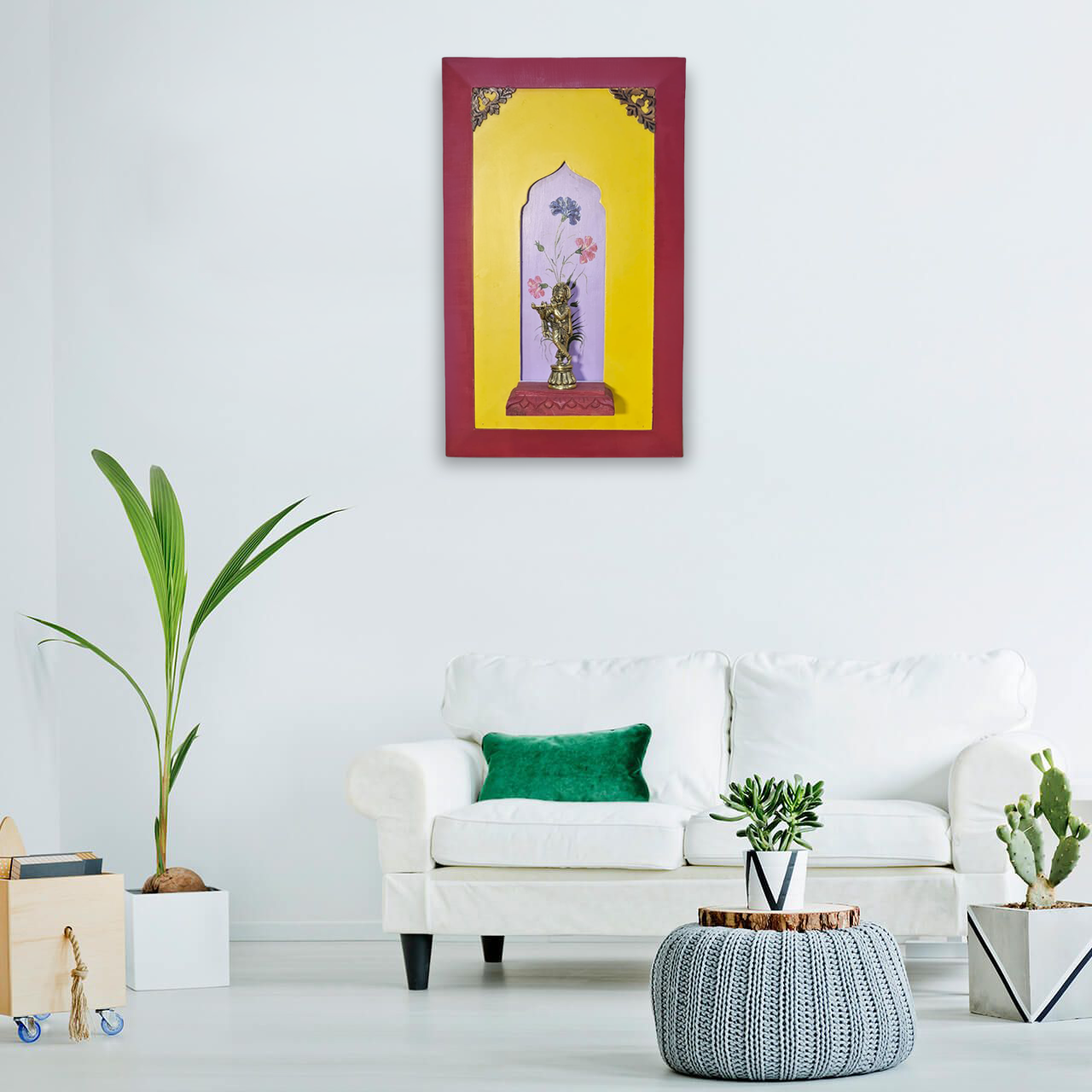 Brass lord Krishna on a wooden stand with a beautiful painting in the background