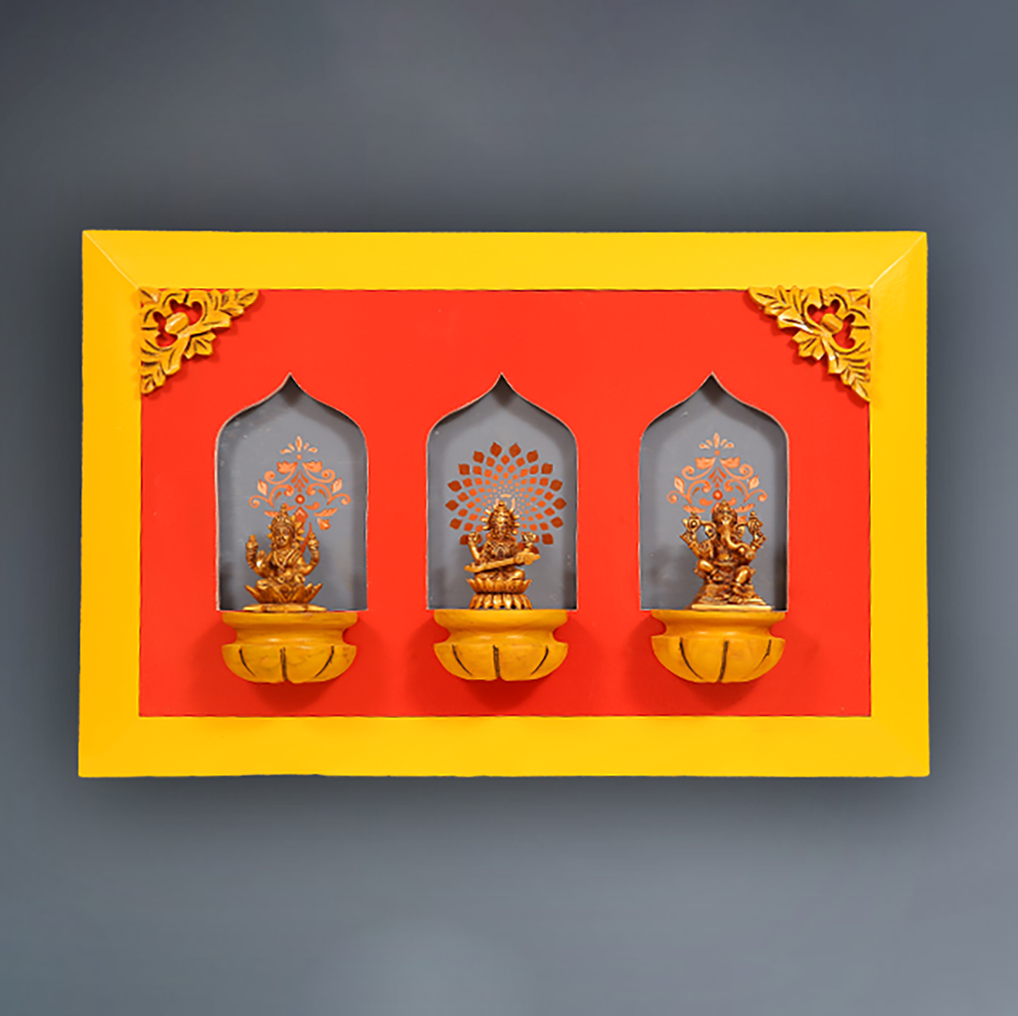 Brass Idols of Sarasvati, Ganesh, and Lakshmi with Stunning Wooden Frame Background Painting