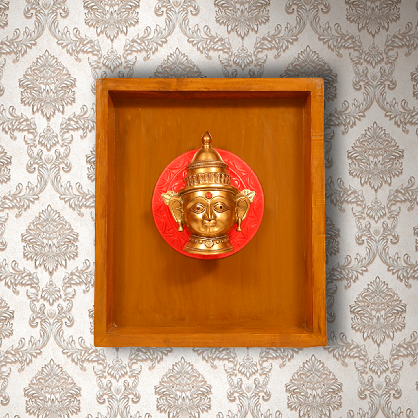 Brass Gauri Mukhalingam Encased in a Wooden Frame