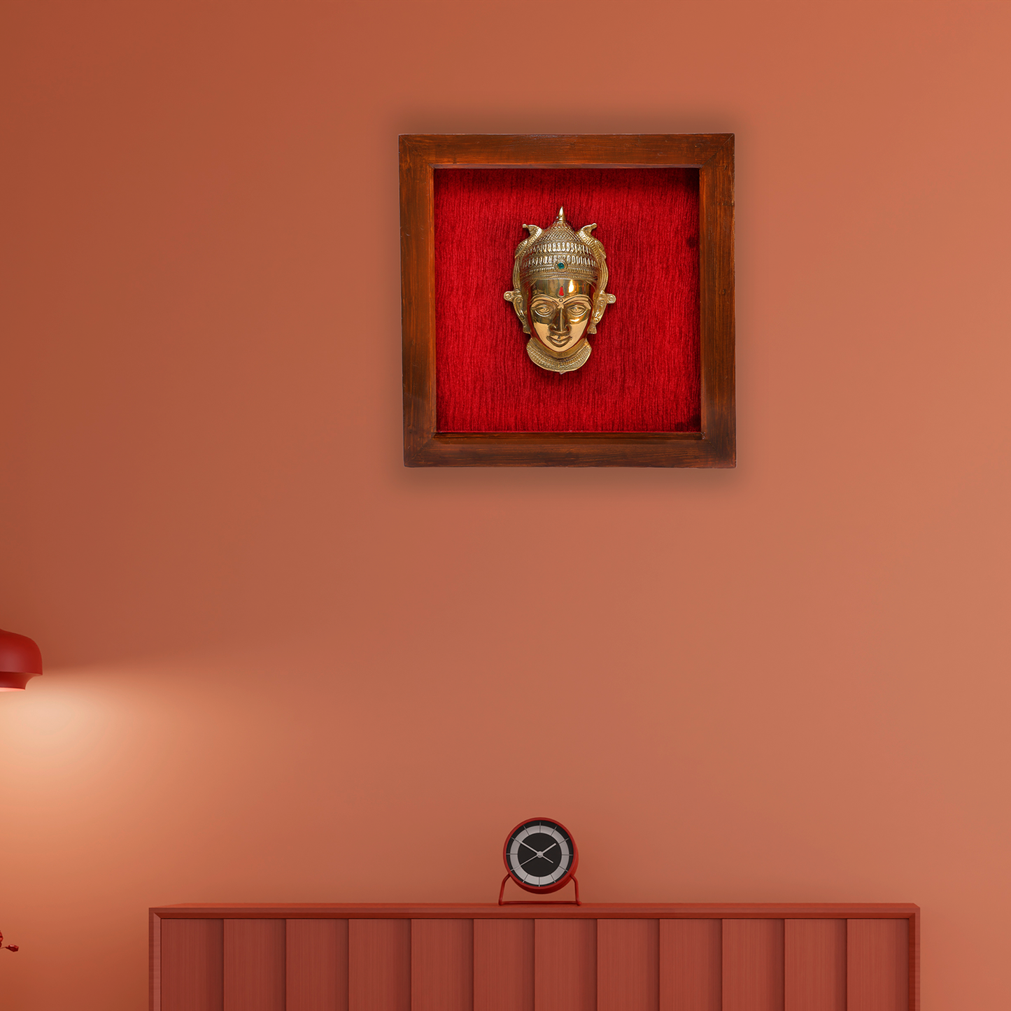 Female figurine in a wooden frame