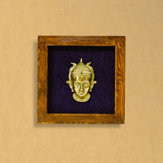 Female figurine in a wooden frame