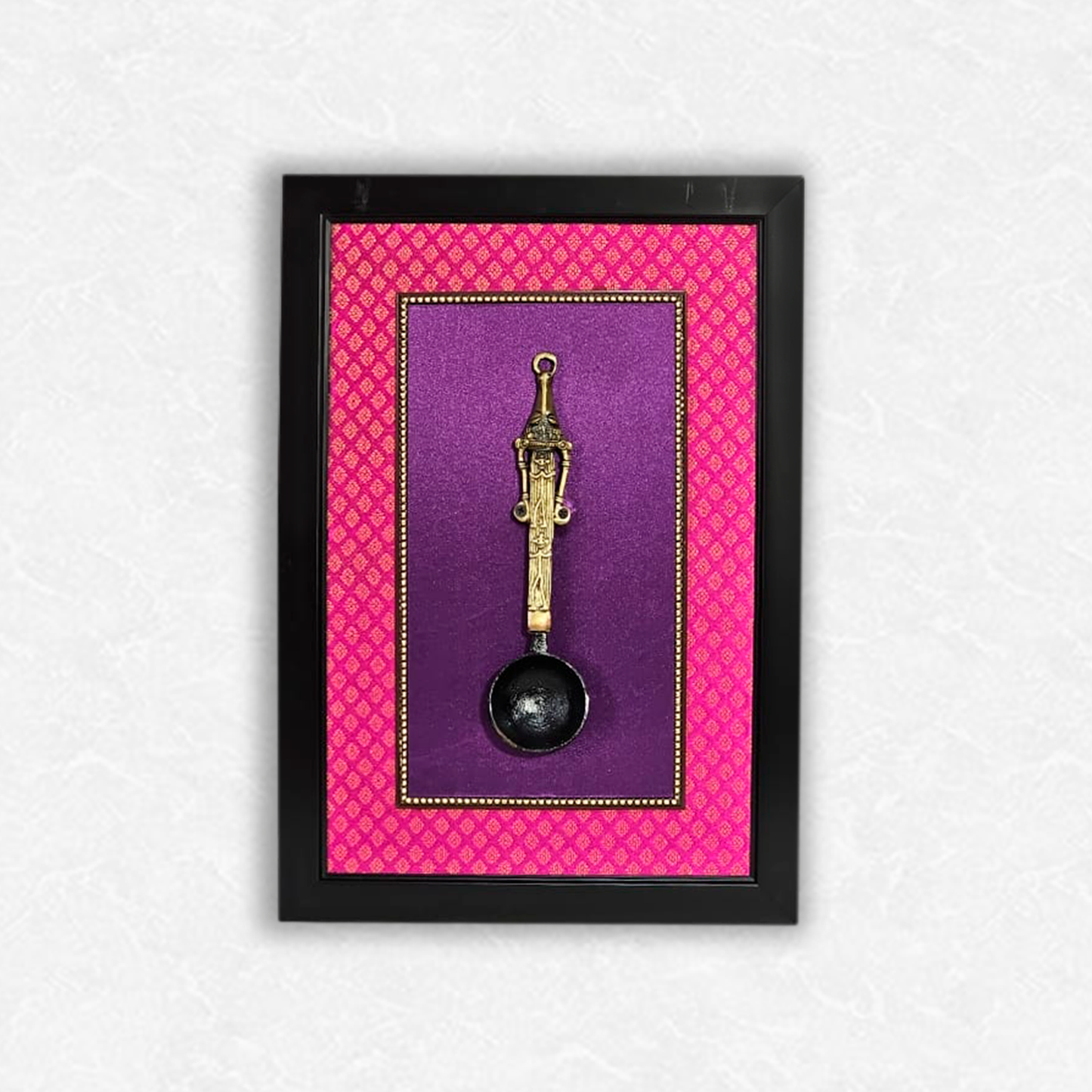 Embrace Tradition with our Brass Kapoor Aarti Spoon in Black Fiber Frame