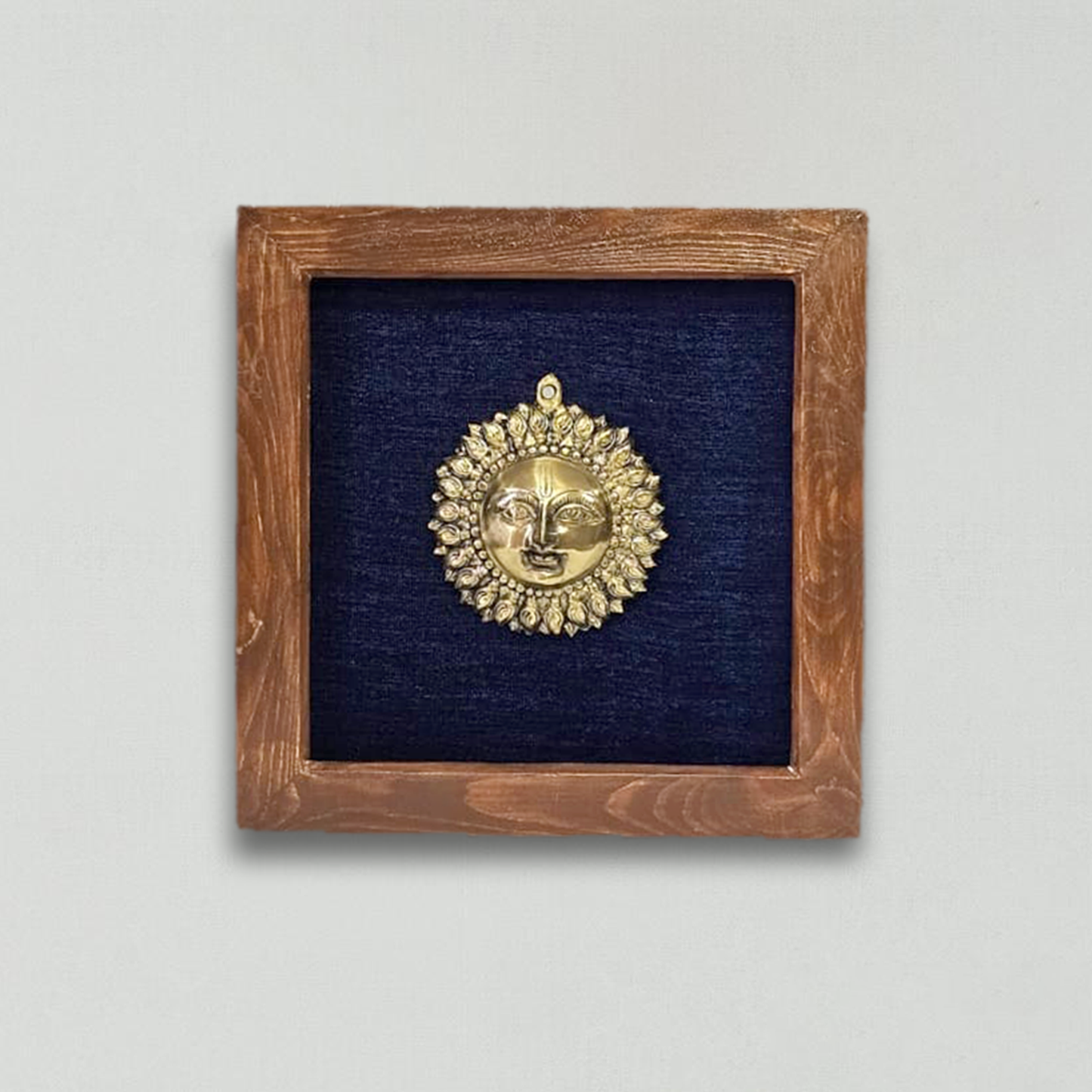 Divine Brass Framed Prabhavali with Surya Narayana on Blue Background