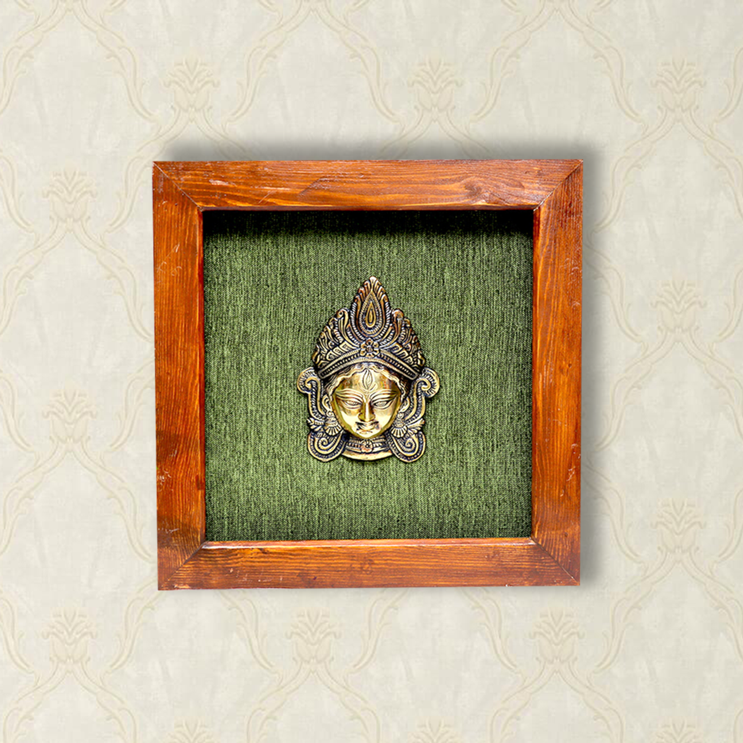 Ma Durga Face Art in Brass, Captured in a Wooden Frame with Green Background