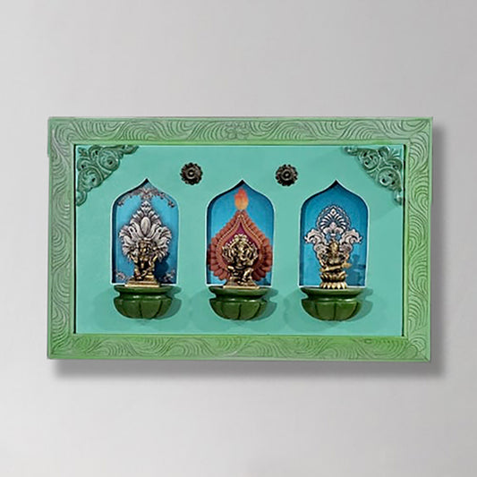 Brass Idols of Sarasvati, Ganesh, and Lakshmi with Stunning Wooden Frame Background Painting